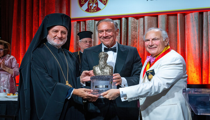 His Eminence Abp. Elpidophoros of America, together with Dr. Anthony J. Limberakis, present the Athenagoras Human Rights Award to the Hon. Michael R. Pompeo. Photo: J. Mindala/Archons