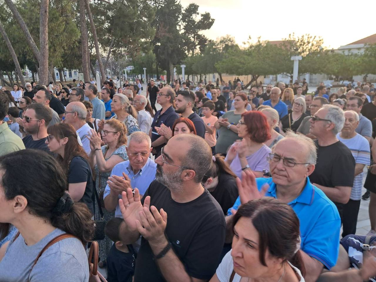 Hundreds of Orthodox Cypriots rally for their hierarch outside of Paphos City Hall.