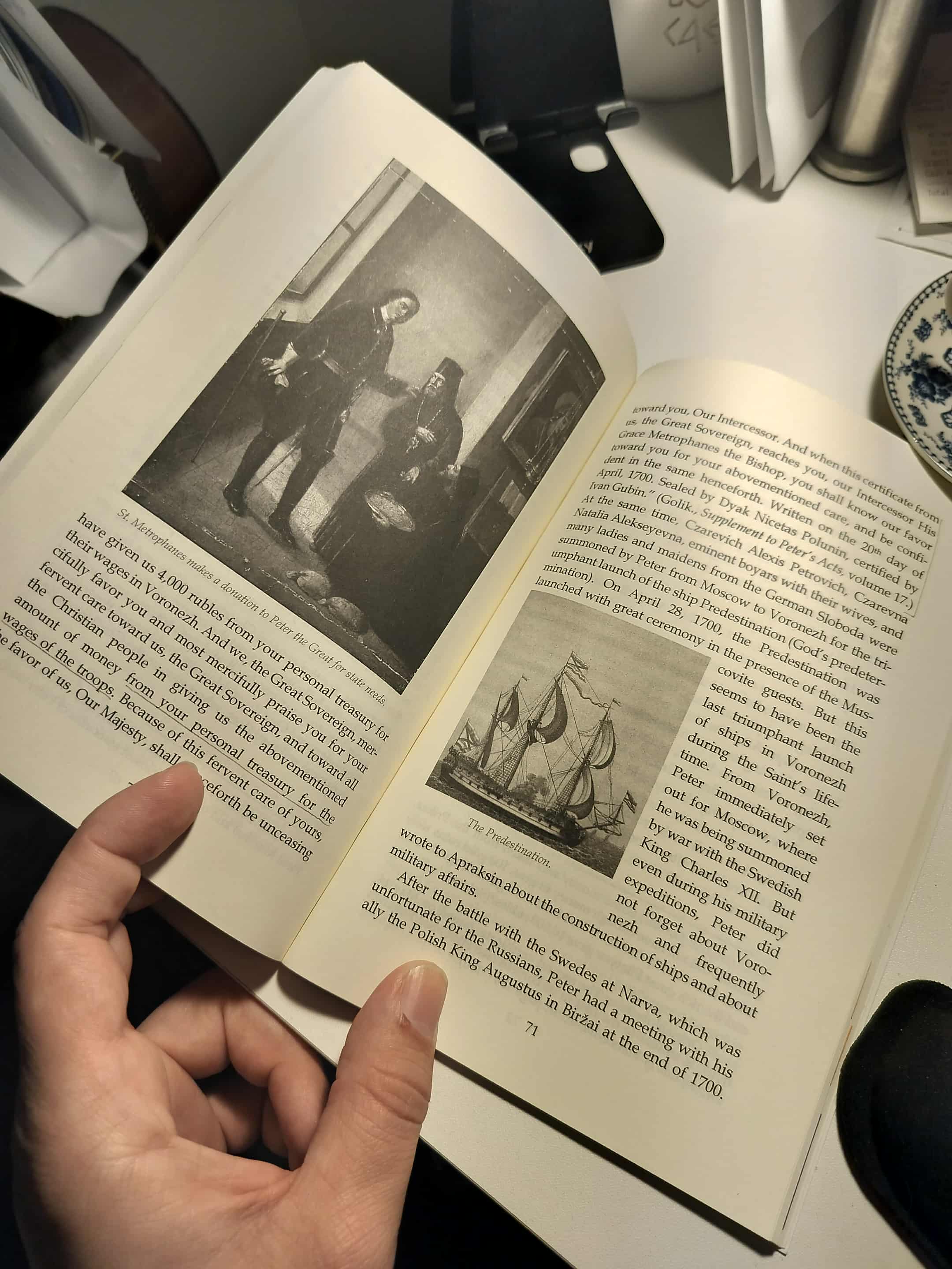 Depiction of St. Metrophanes with Tsar Peter from the book. On the right side is a photo of the Predestination, a ship built with donations from the Church for the defense of the nation.